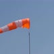 The Aerodrome Cone-wind Indicator Flutters Against the Blue Sky - VideoHive Item for Sale