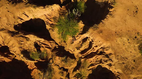 Aerial shot goes up like a Rocket revealing the Tatacoa Desert, Colombia.