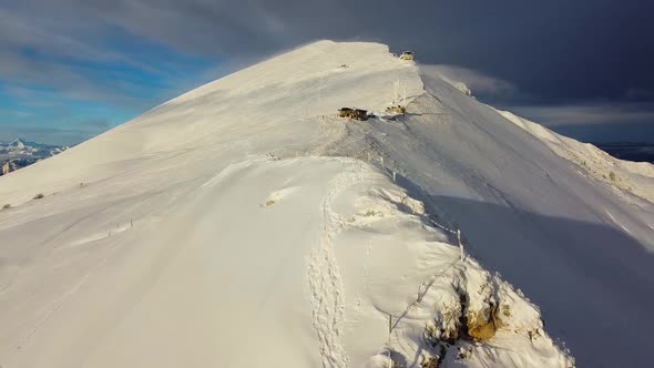Drone fly over the Snow Mountains peak