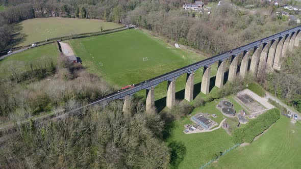 A Narrow Boat, canal boat crossing the Pontcysyllte Aqueduct, designed by Thomas Telford,  located i