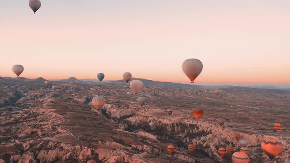 Balloons in the Sky at Sunrise