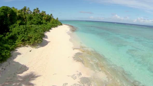 Aerial drone view of a scenic tropical island in Fiji