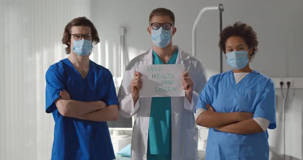 Multiethnic Physicians and Nurses Wearing Protective Mask Showing Safe Health Care System Poster