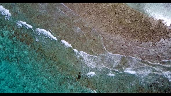 Aerial view landscape of marine shore beach holiday by blue water and white sand background of journ