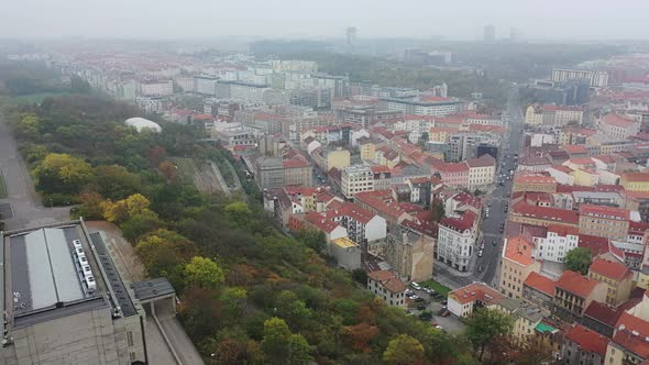 Aerial View of Citycape of Old Town of Prague, with a Lot of Rooftops, Churches, and the Landmark of