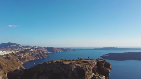 4k Aerial drone footage flying over Skaros rock Caldera Santorini Greece