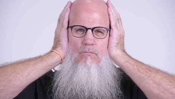 Mature Bald Bearded Man Doing Three Wise Monkeys Concept