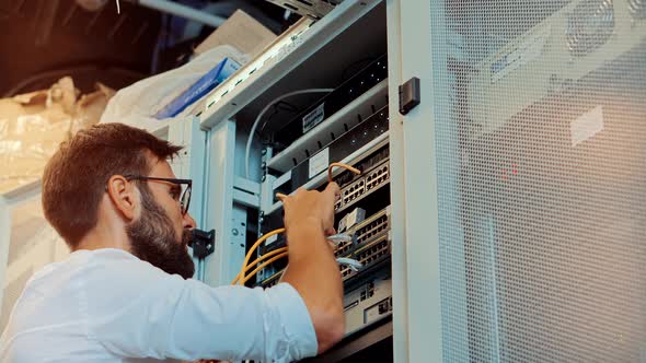 Technician Testing Network Connection. Hardware Updates On Server Room. Engineer Connect Cable.