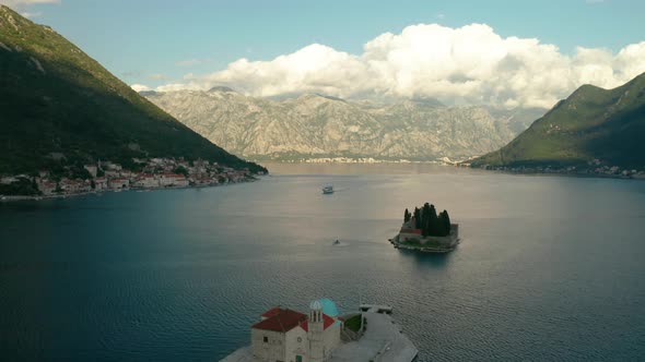 Aerial View of Our Lady of the Rock on Shore of Boka Kotor Bay Montenegro
