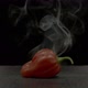 Chili with smoke effect on black background - VideoHive Item for Sale