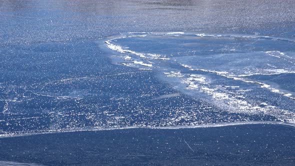 Frozen Floe Ice on Water Surface