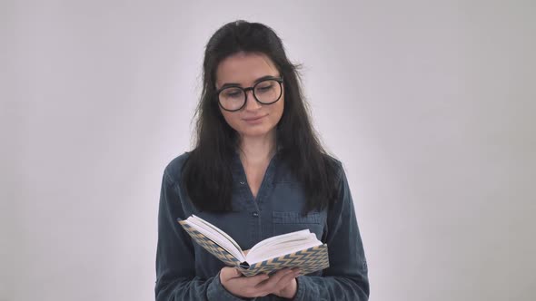 Caucasian Student Reads Indoors