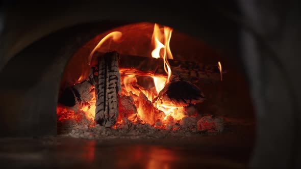 Firewood Burning Stone Oven at Italian Restaurant Kitchen
