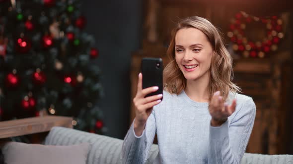 Woman Talking Online Video Call Use Smartphone Celebrating Christmas Eve