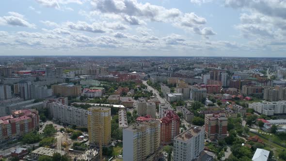 Aerial view of the City. Modern high-rise buildings and old low houses