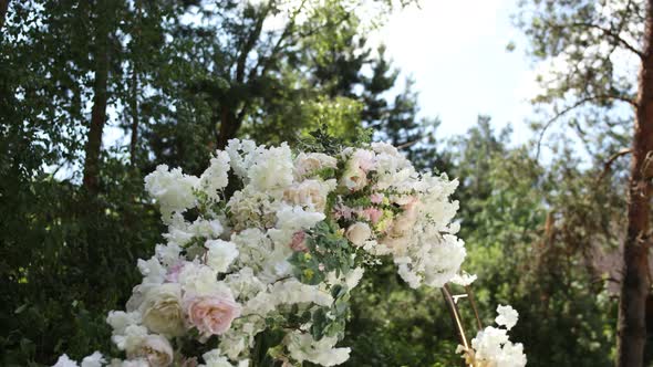 round wedding arch of flowers for the ceremony in the park close-up decor