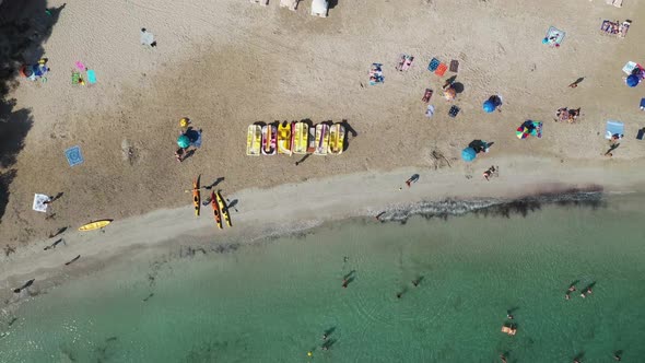 Straight down aerial footage of the Spanish island of Ibiza showing the beautiful beach front