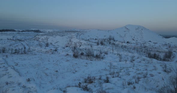 Snow-capped Mountains And Forests In Winter