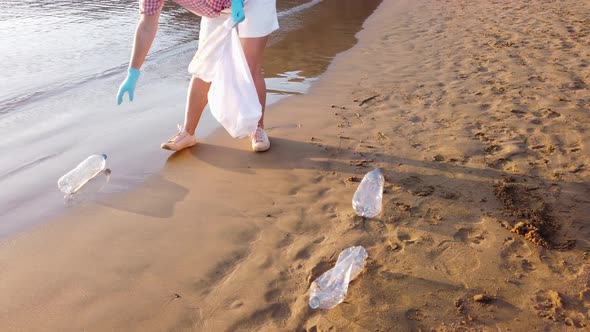 Cleaning Plastic on the Beach