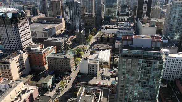 Wide Aerial Time lapse shot of Intersection in Vancouver downtown on sunny day