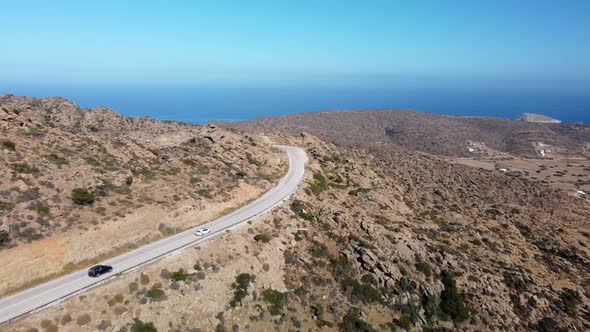 Scenic coastal road close to Magganari beach, Ios island, Greece