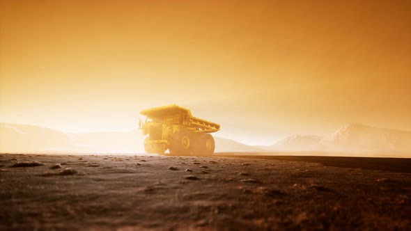 Big Yellow Mining Truck in the Dust at Career