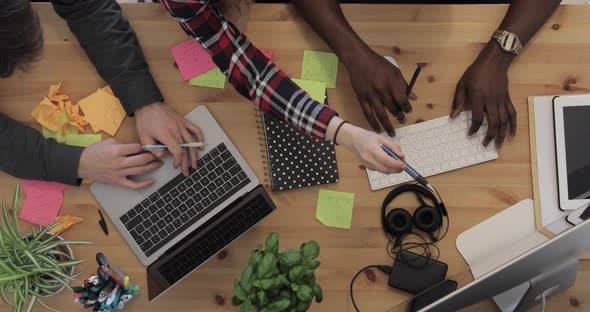 People working together at startup office, top view