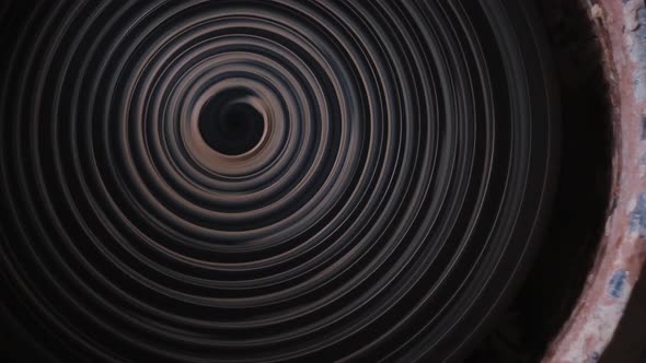 Twisted Pottery Wheel Top View. Round Striped Black and White Clay Lines