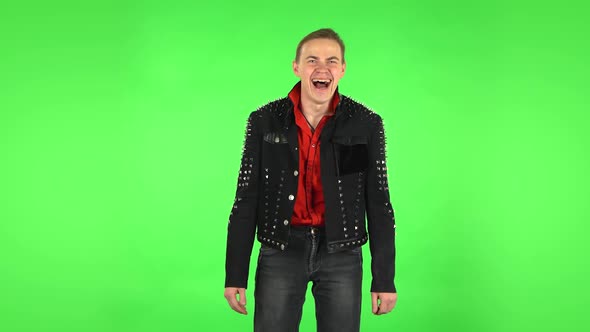 Guy Bursting with Laughter Being in Positive Over Green Screen