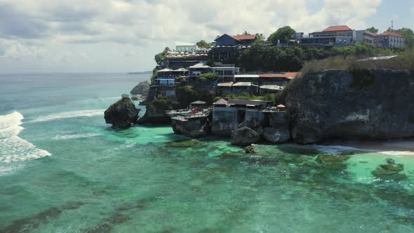 Aerial Drone Flight Over Cliff at Suluban Beach Bali Indonesia