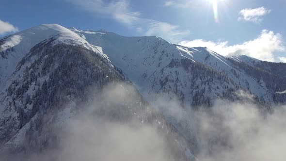 Pass Through the Clouds Into the Snowy Forest