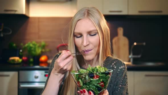 Glad Woman Eating Healthy Salad