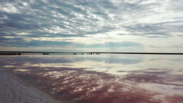 Pink Lake During Sunset Colorful Sky Clouds Reflecting Water