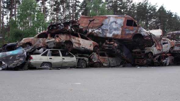 War in Ukraine a Dump of Shot and Burned Cars in Irpin Bucha District