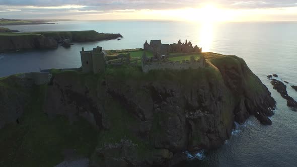 Aerial view of the Dunnottar Castle at sunrise