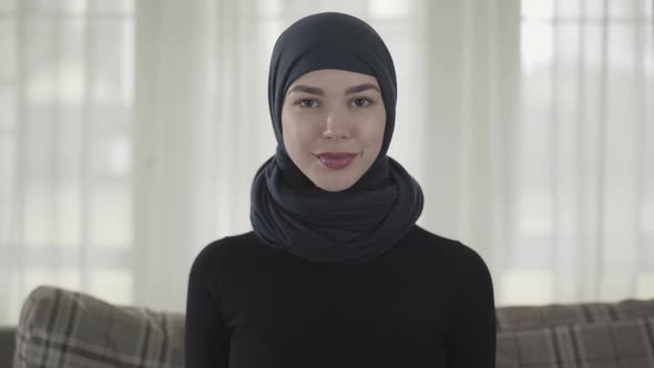 Close Up Portrait of Successful Confident Young Muslim Business Woman Looking at Camera Smiling
