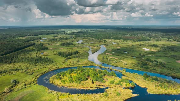 Timelapse Dronelapse Hyperlapse Aerial View Spring Forest Woods And Curved River Marsh