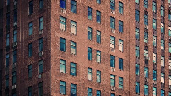 Clouds Reflected In Apartment Building In The Evening