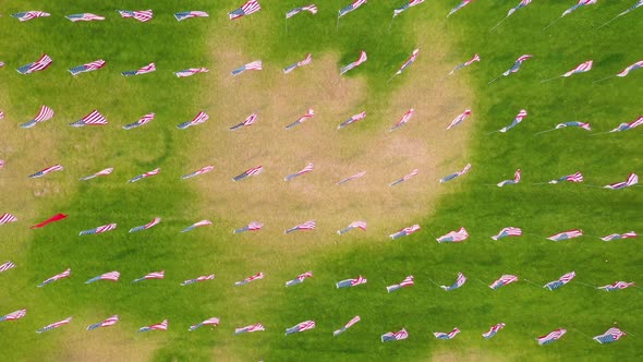 The Waves Of Flags Display At Alumni Park At Pepperdine University In Malibu - aerial top down