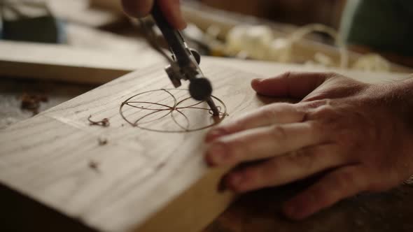 Man Making Pattern on Wooden Product Indoors