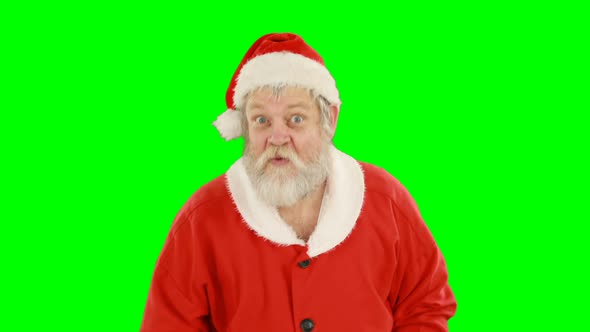 Santa claus with finger on lips
