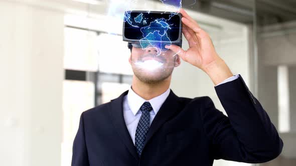 Businessman in Vr Headset with Earth Projection