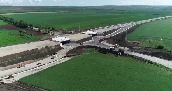 Aerial view of highway construction site. Overpass, highway intersection.