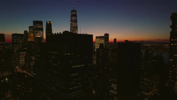 Slide and Pan Elevated Footage of Modern Tall Office Skyscrapers in Financial District Against