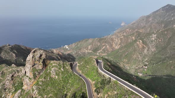 Aerial Drone View of a Wild Touristic Twisty Road in the Green Lush Mountains Along the Atlantic