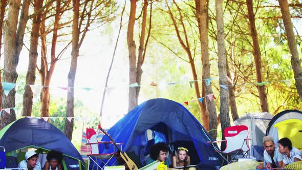 Couples relaxing on tent at music festival 4k