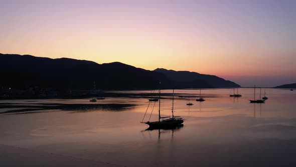 Boats in the Sea at Sunset in Summer