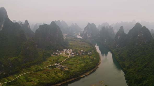 Aerial shot of the amazing rock formations along the Li River in China