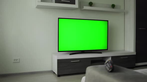 Slider Truck Shot of Lcd TV 55 Inches with Green Screen Chromakey in Empty Modern Interior Apartment
