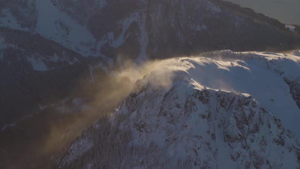 Aerial View From Airplane of Fresh Snow Covered Canadian Mountain Landscape